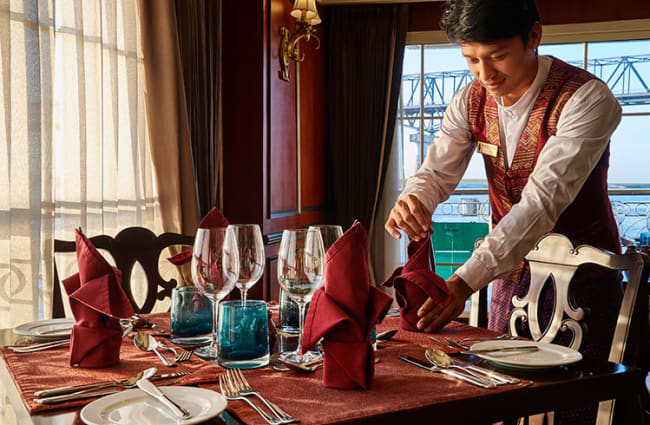 Waiter preparing the table