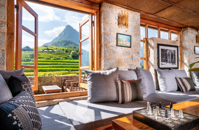 Sitting area by the window with mountain' view