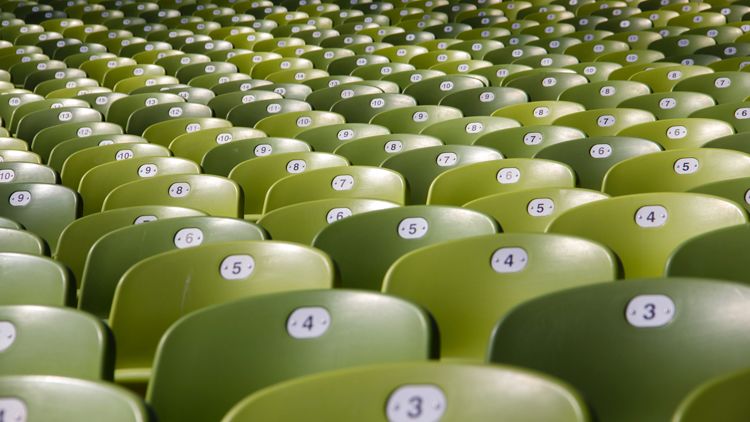 A sea of green chairs