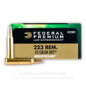 Rifled Slug Shotgun Shells with 223 Caliber Bullets Along with 45 Caliber  and 9mm Hollow Point Bullets Stock Photo - Image of shiny, group: 156114842