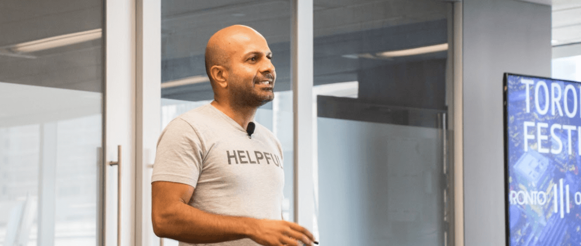 man at Elevate Toronto wearing tshirt with print "HELPFUL"