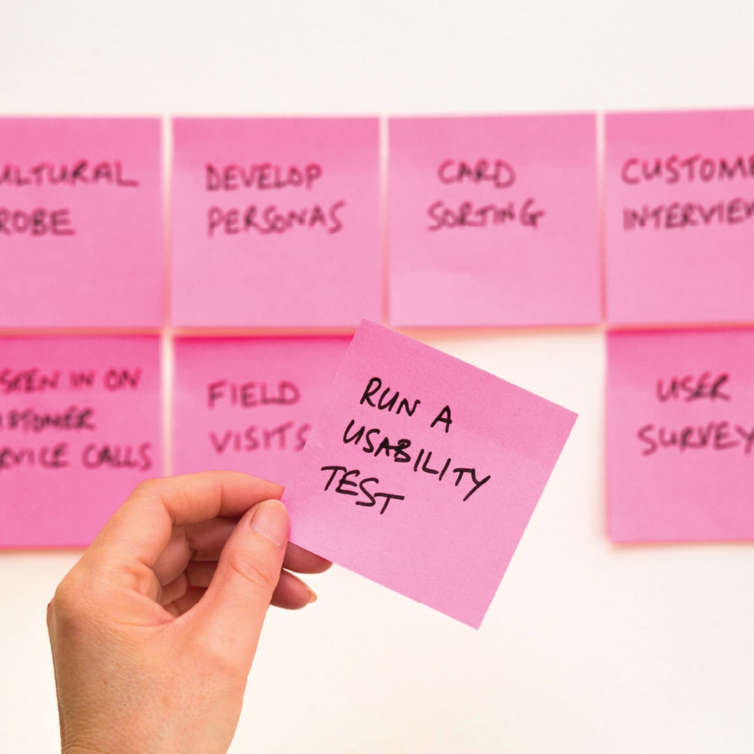 "Run a usability test" written on a sticky note