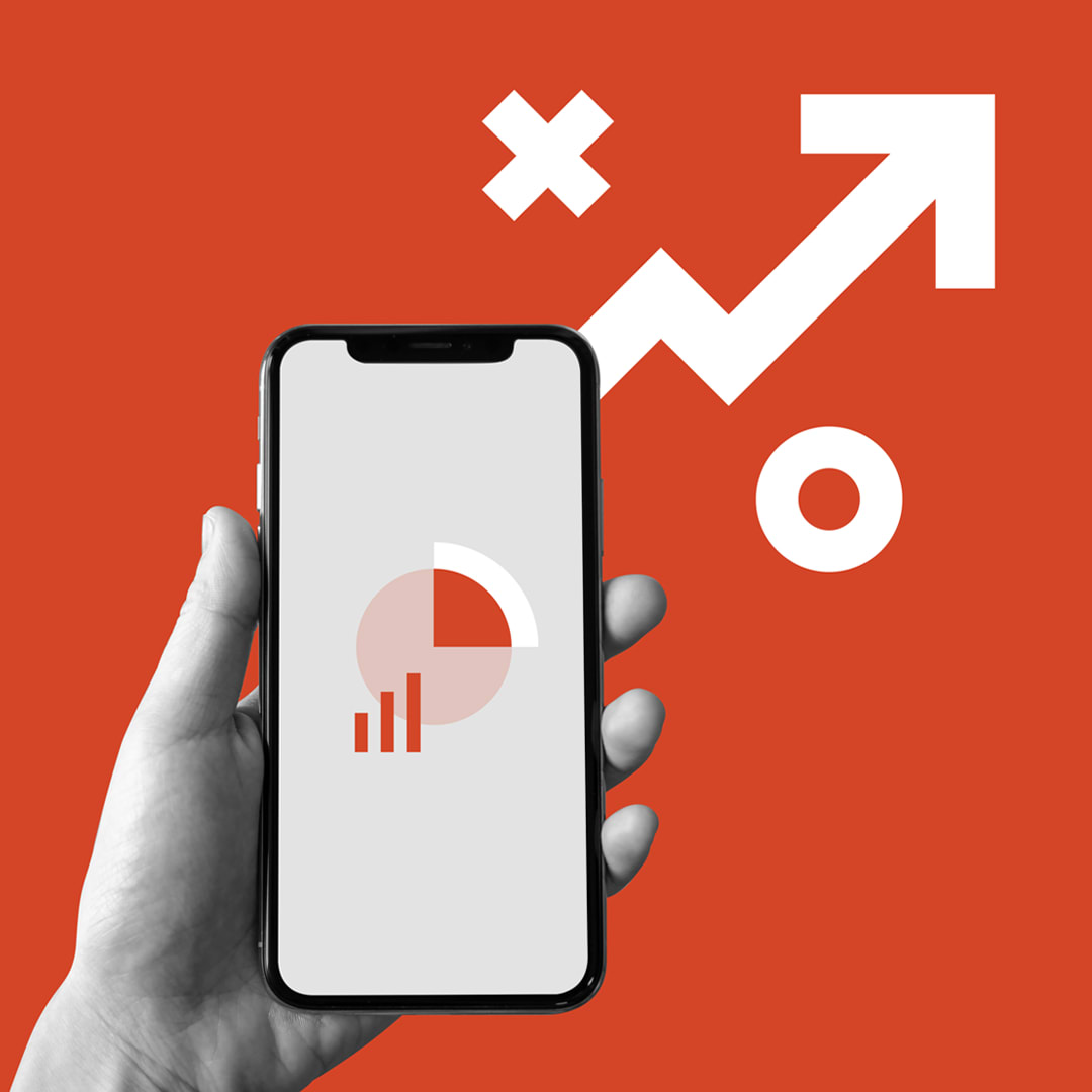Graphs on mobile and upward trending line graph