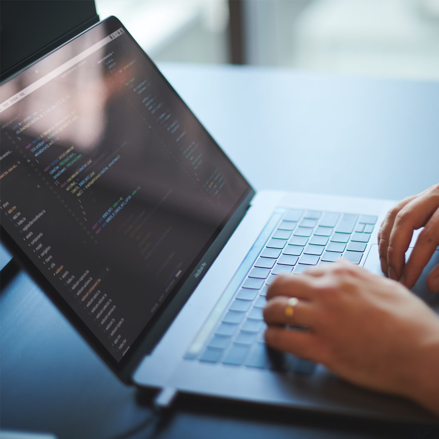 coding on laptop