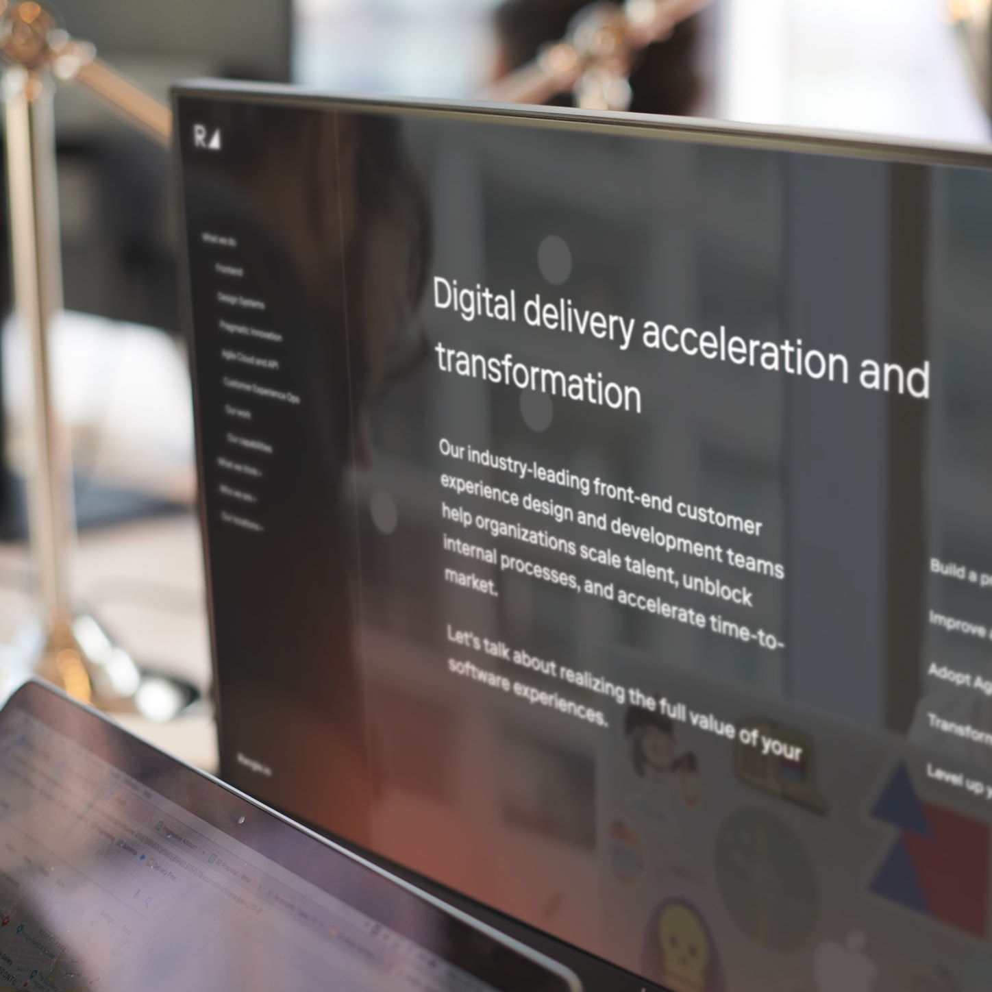 Image of a monitor showing Rangle's "Digital delivery acceleration and transformation" webpage
