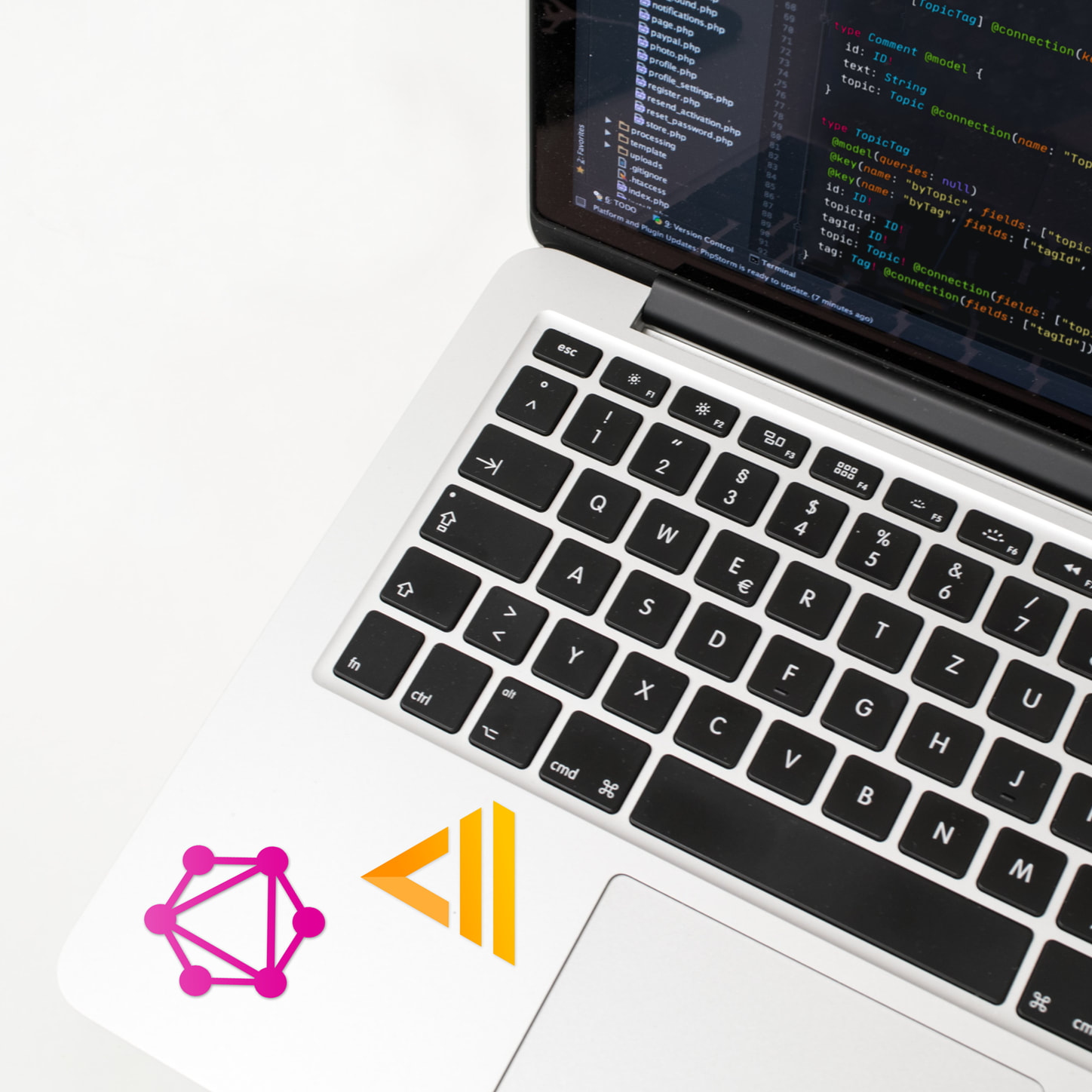 GraphQL and AWS Amplify logo's on a laptop