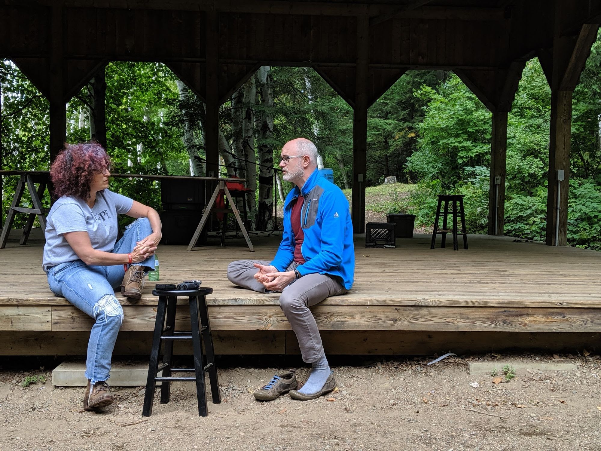 A discussion by a gazebo