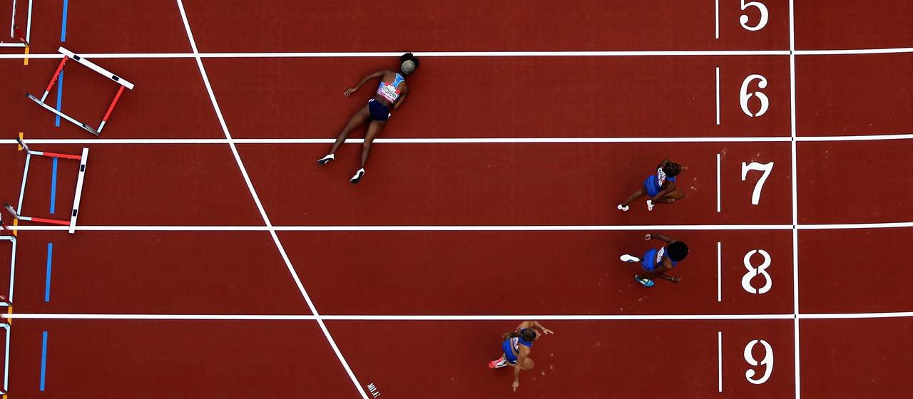 A individual collapsed after tripping hurdle