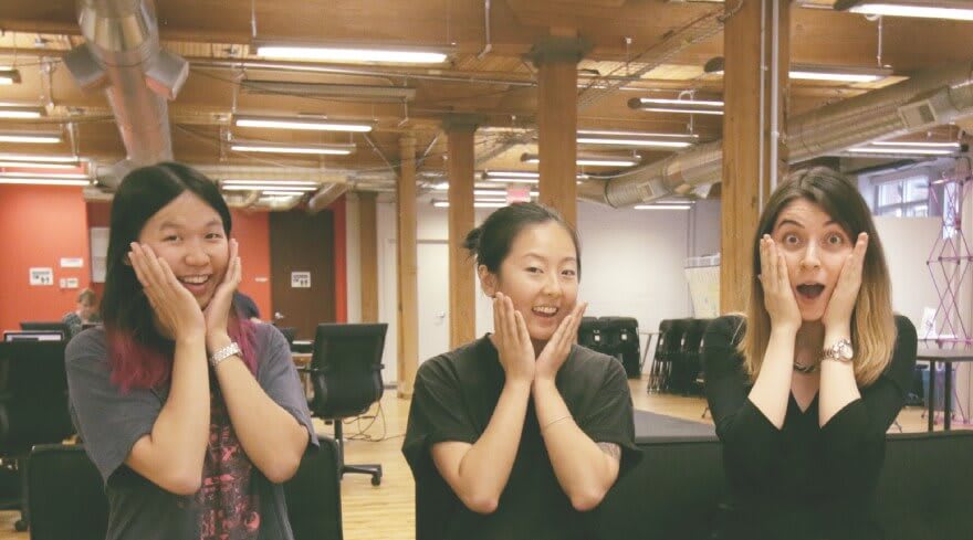 3 women with hands under their faces to look surprised