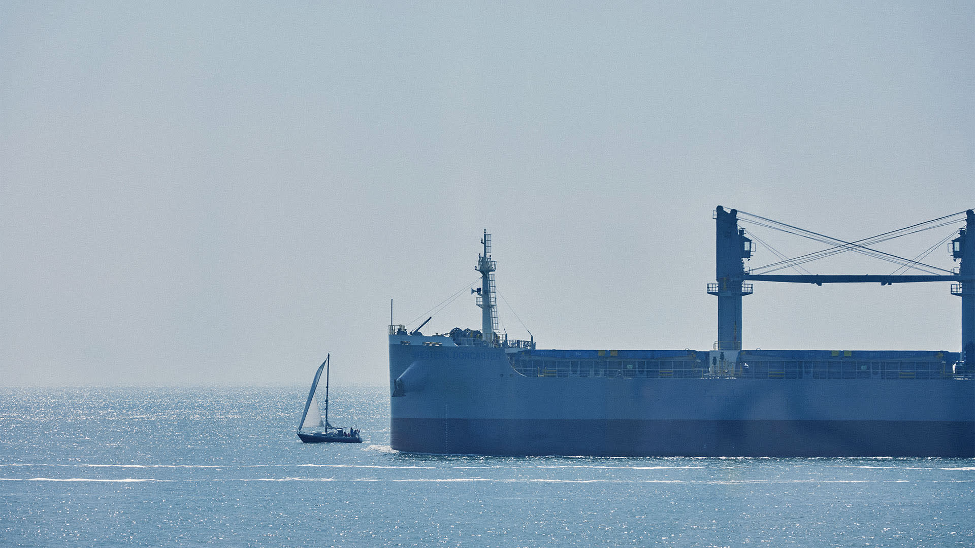 tanker and sailboat