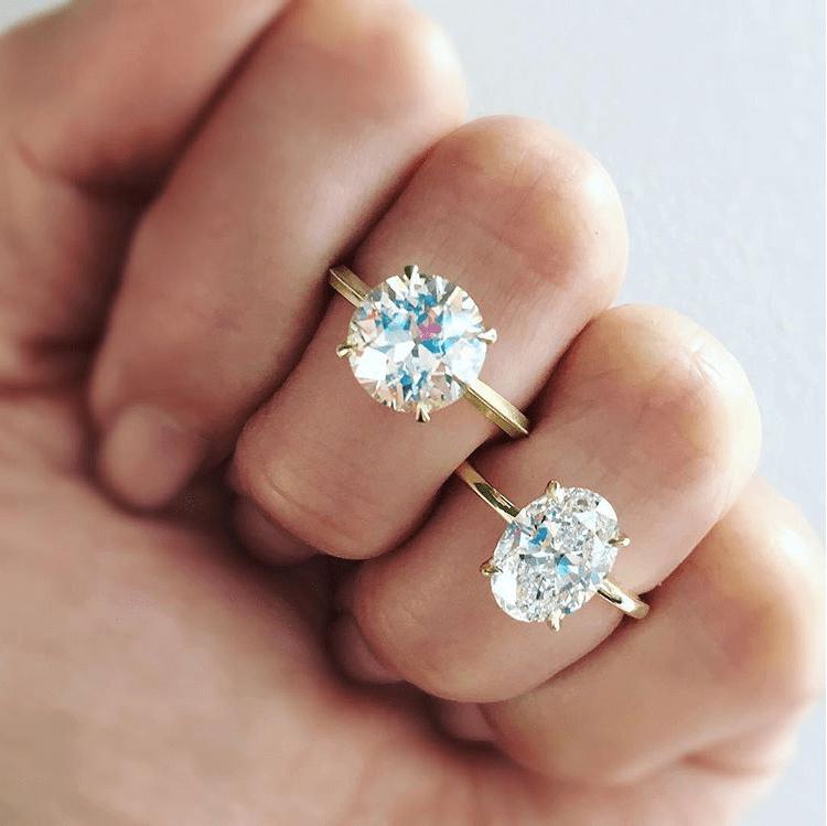 Oval vs. round diamond on a womans fingers