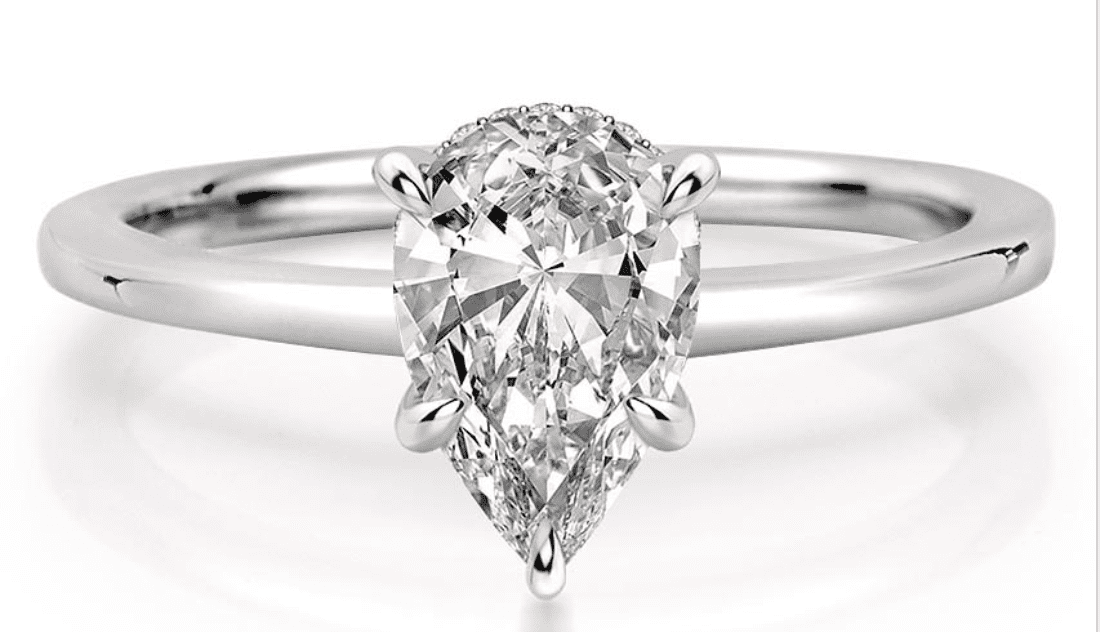 pear solitaire ring in white gold 