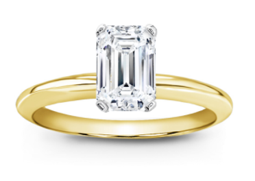 Solitaire emerald cut diamond set in a two tone setting