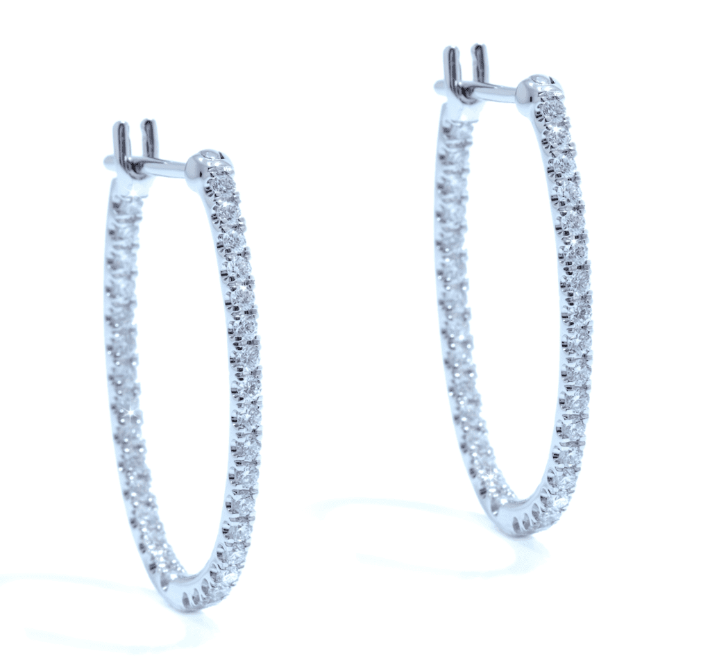 A pair of pave diamond hoop earrings 