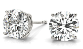 4 prong white gold studs with diamond center