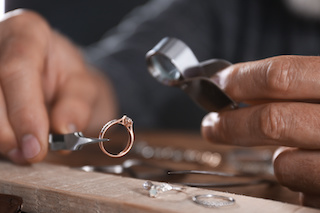 lab diamond in loupe and ring