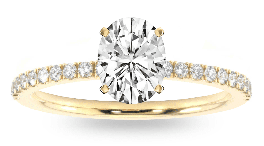 Image of a yellow gold oval diamond ring with pave side stones