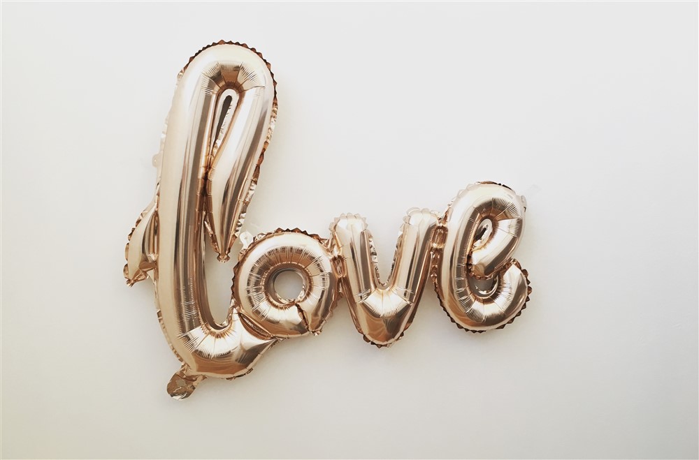 Gold blow-up of the word Love in script