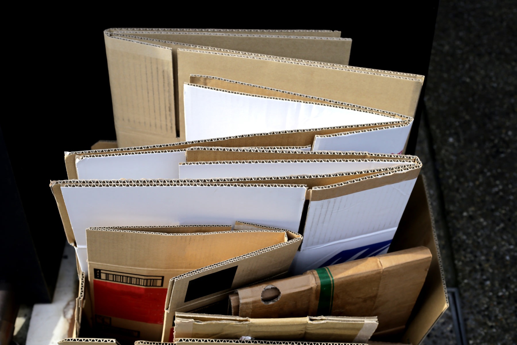 AdobeStock image of cardboard boxes ready for recycling