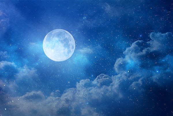 Adobe Stock Image of moon, stars, and clouds on deep blue sky