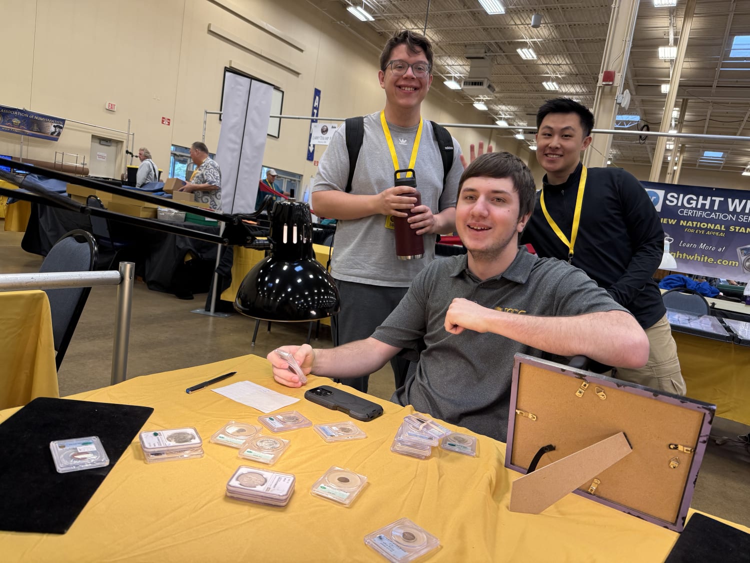Colin, Max, and David examining inventory