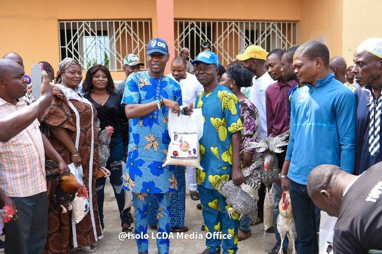 YULETIDE: ISOLO COUNCIL BOSS, OLASOJU FETES PARTY EXCOS, DOLES OUT BAGS OF RICE, CHICKENS