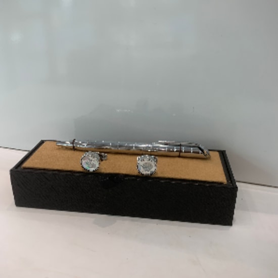 Cuff links and pen