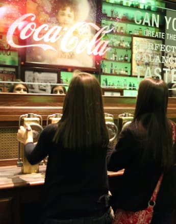 Guests interacting with a tasting exhibit