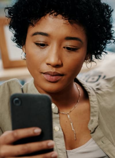 A woman shopping on her phone