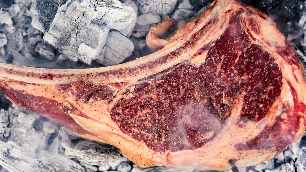 Steak Cooked Directly on Hot Coals Works - cooking steaks