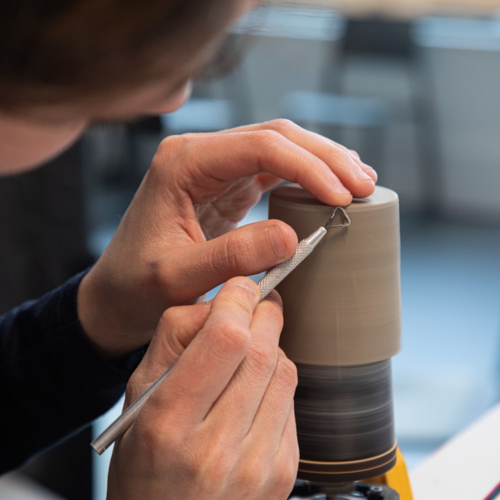 Yael Rosenberg carving patterns in the clay sample