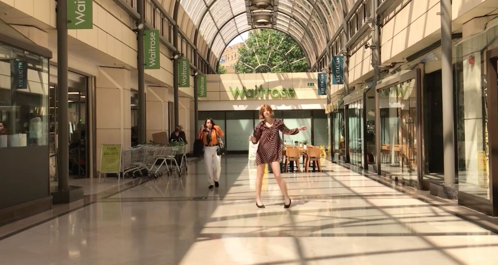 Friederike, dancing in a shopping mall – a re-enactment of Gillian Wearing's performance 'Dancing in Peckham'. 