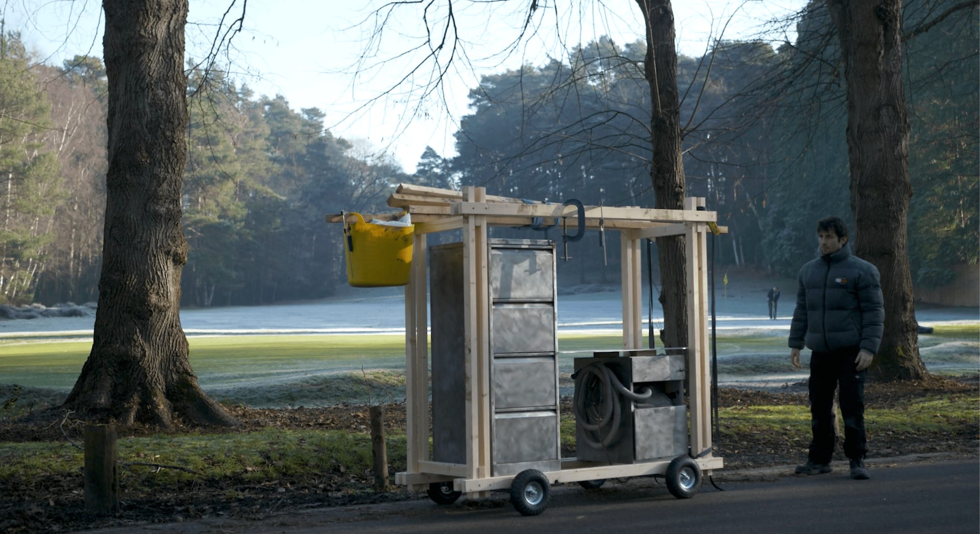 Man Standing with mobile workshop