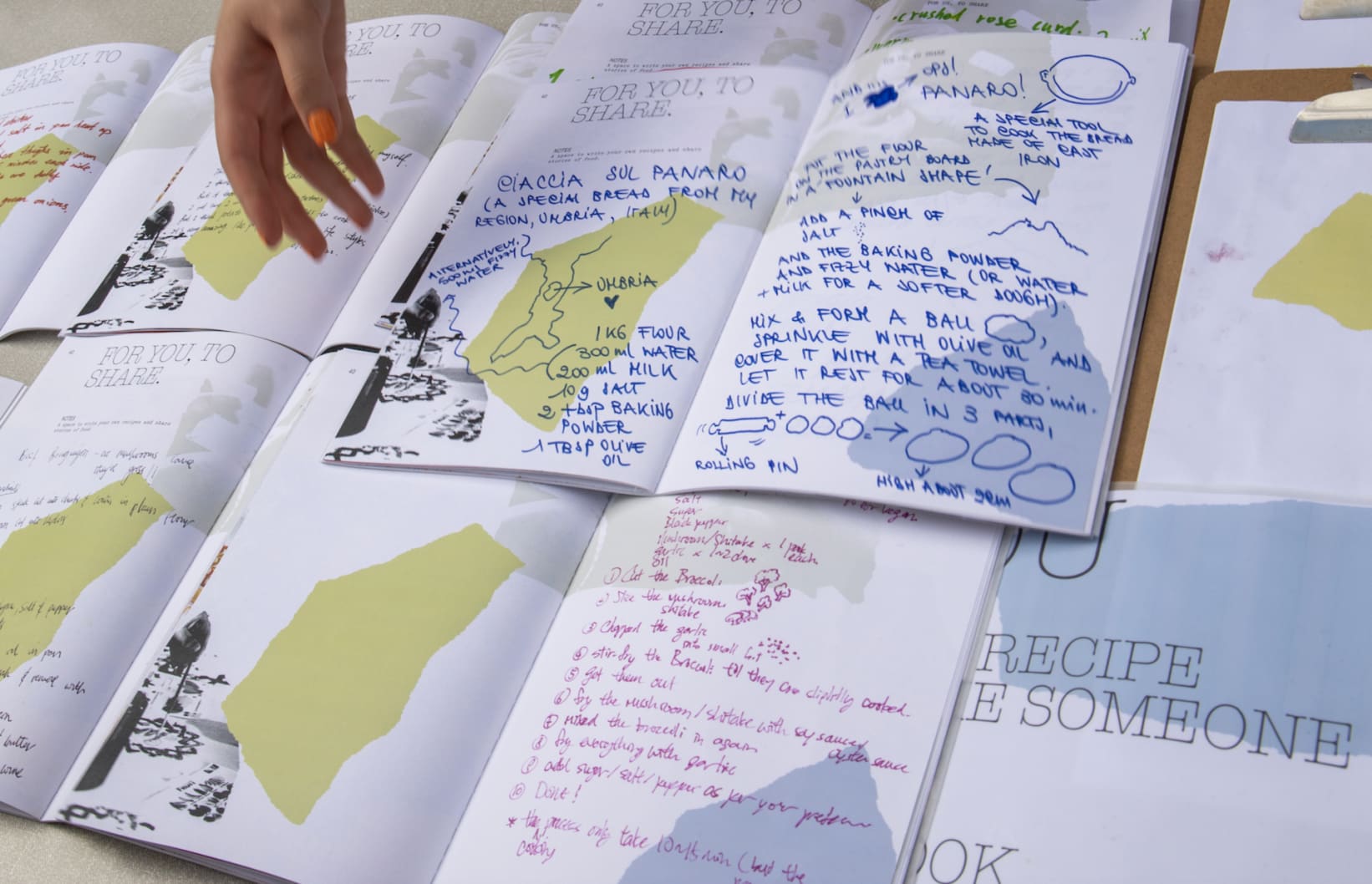 A selection of books showing handwritten recipes that were shared