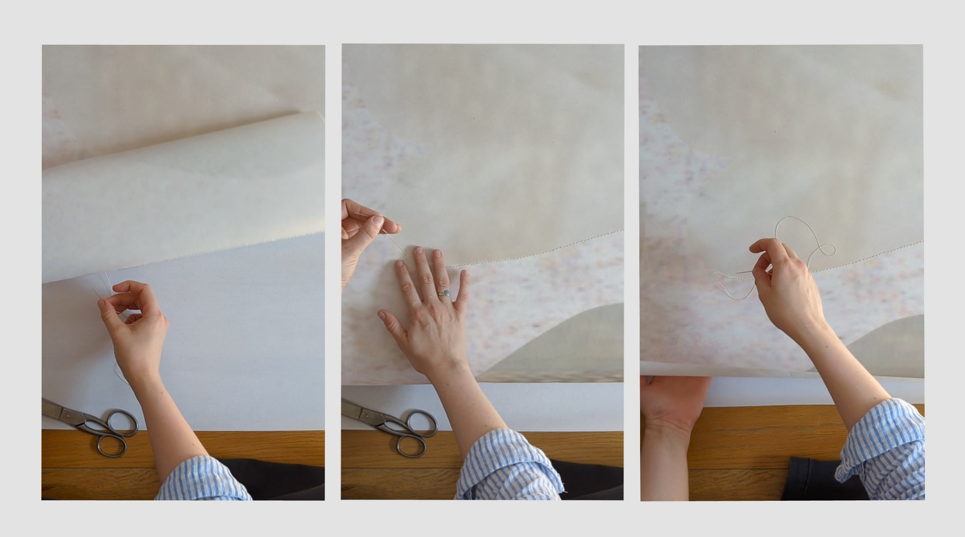 A top down photograph of a white woman's hand embroidering thin translucent paper