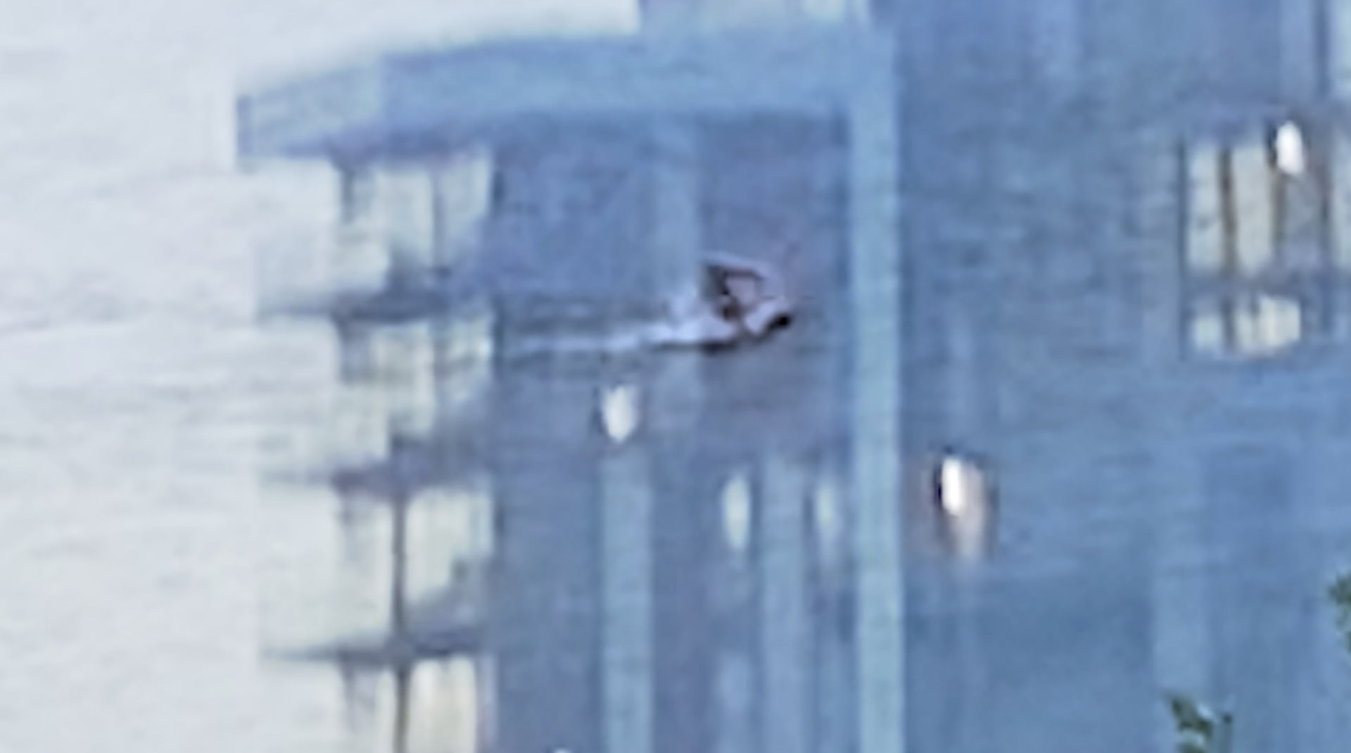 a layered image of a swimmer and my block of flats