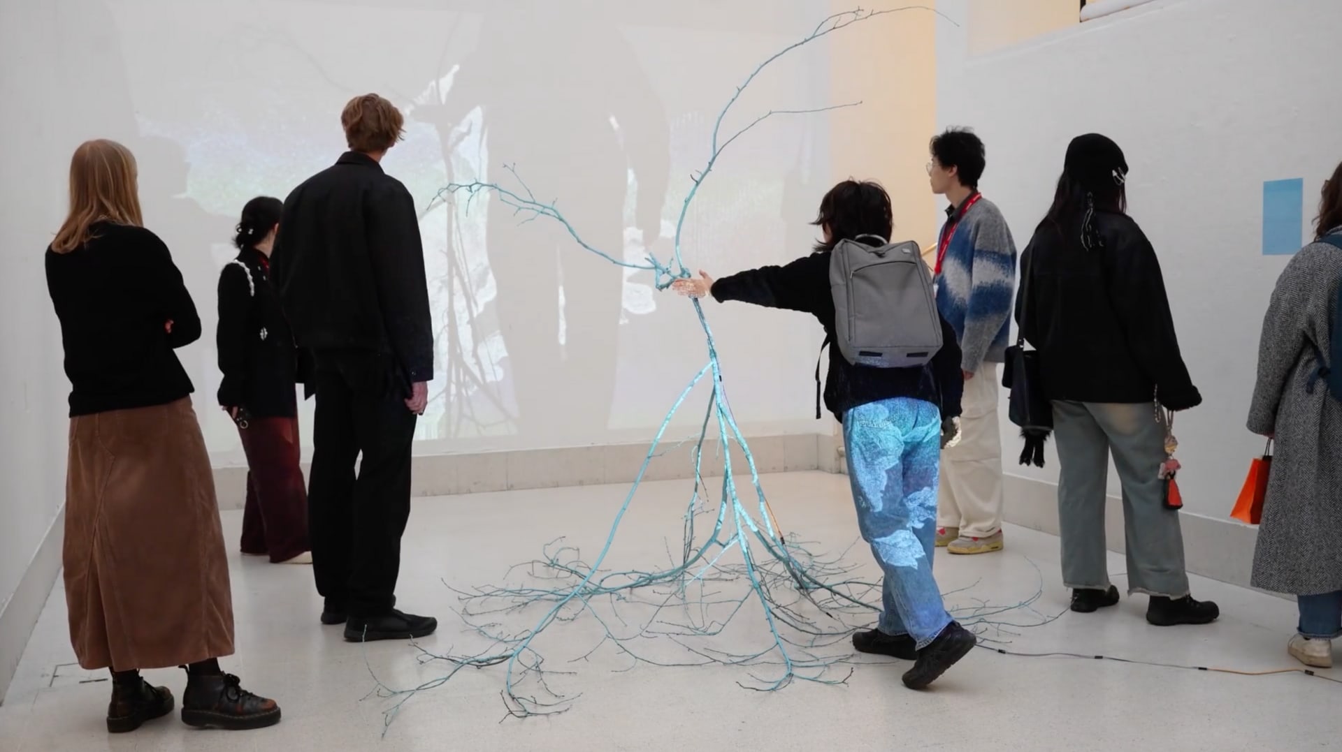 Group of seven visitors at the exhibition.