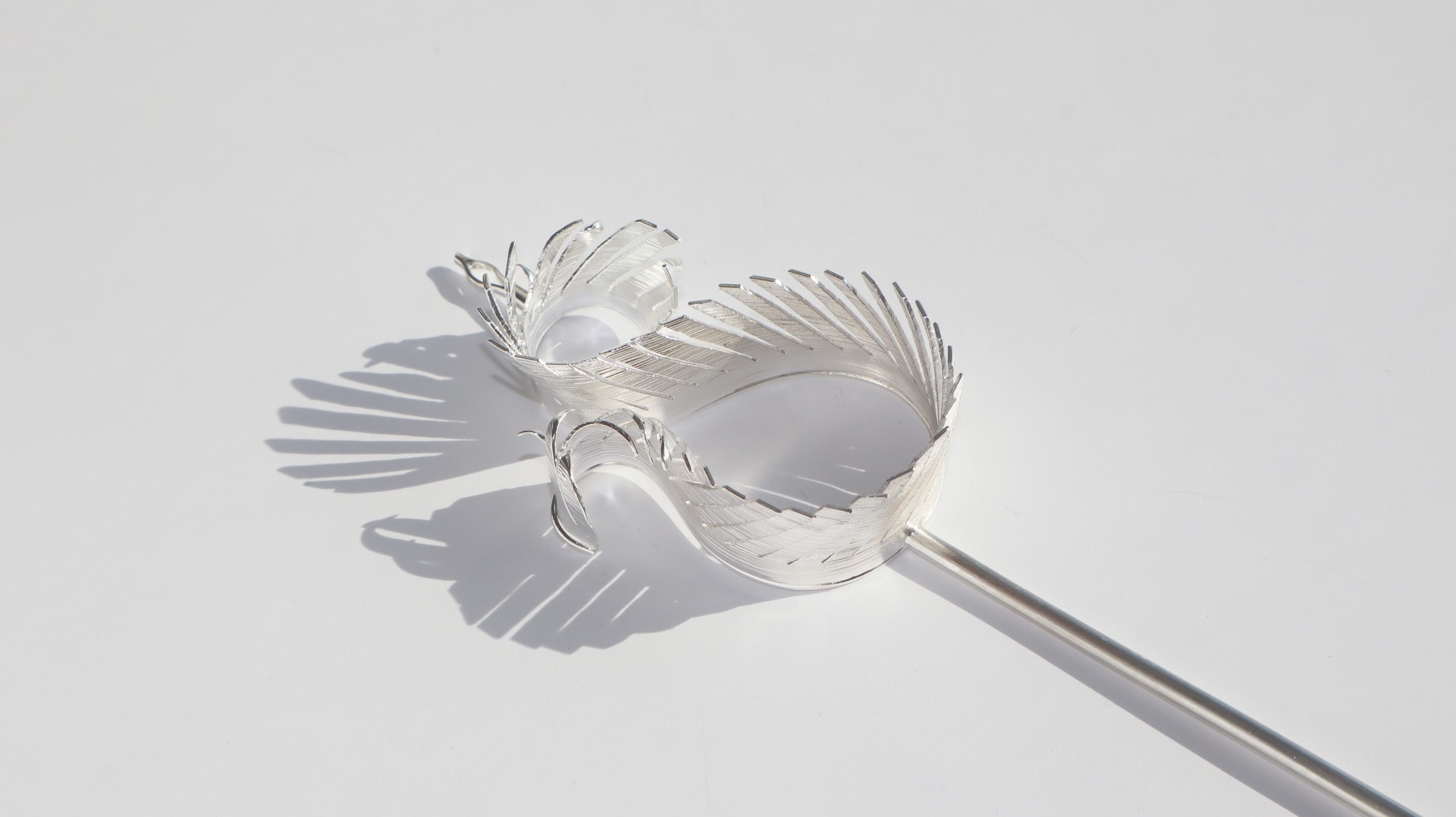 Feather inspired silver hairpin