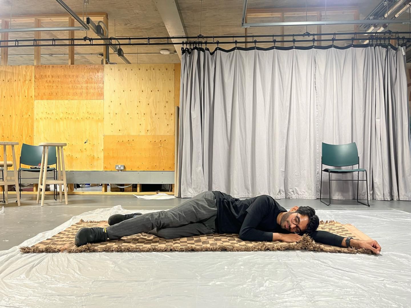 Picture of artist lying on the floor