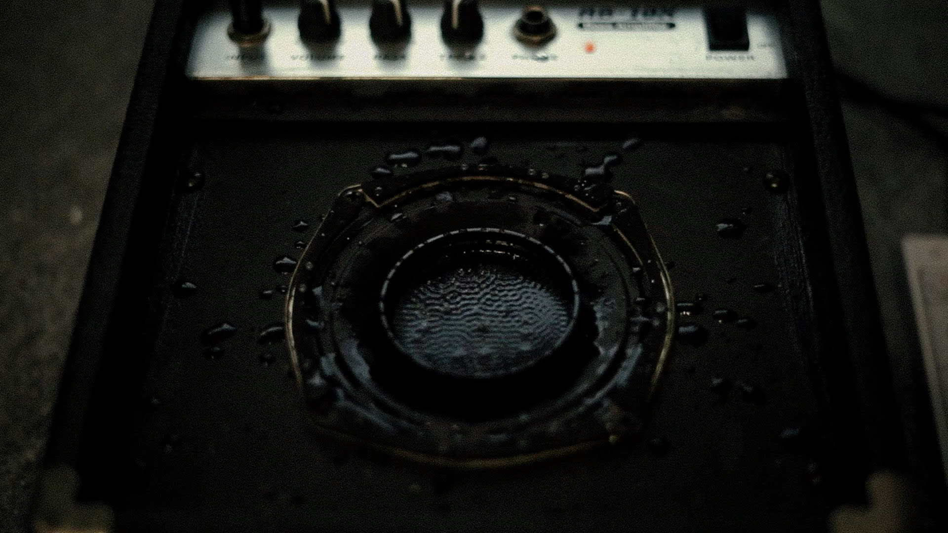 Cymatics are patterns that appear on the surface of a vibrating pool of water, a speaker cone is used here.