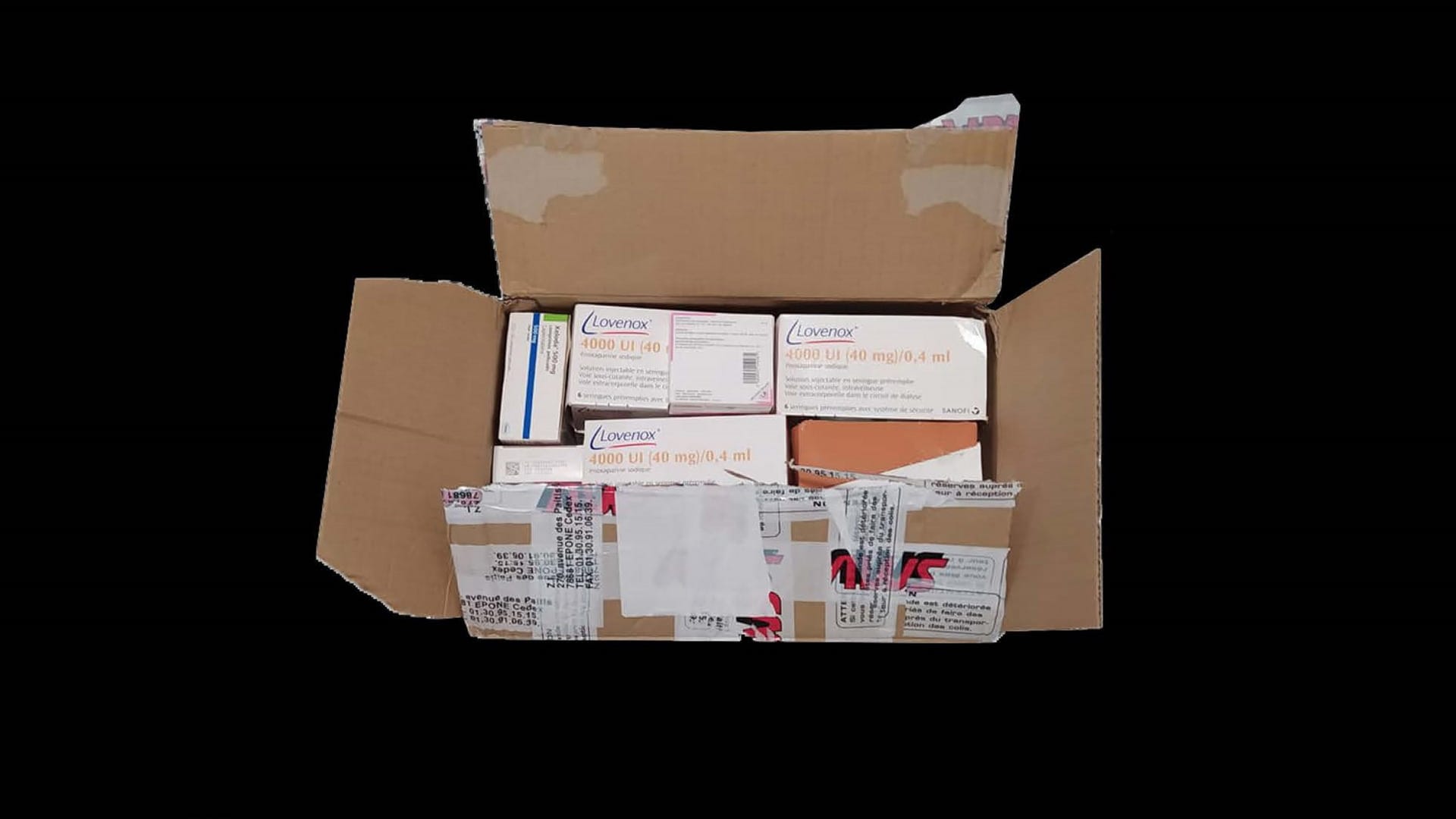 Package of donated medicine arriving at the KIFA.A (Solidarity Clinic and Pharmacy of Athens) from France.