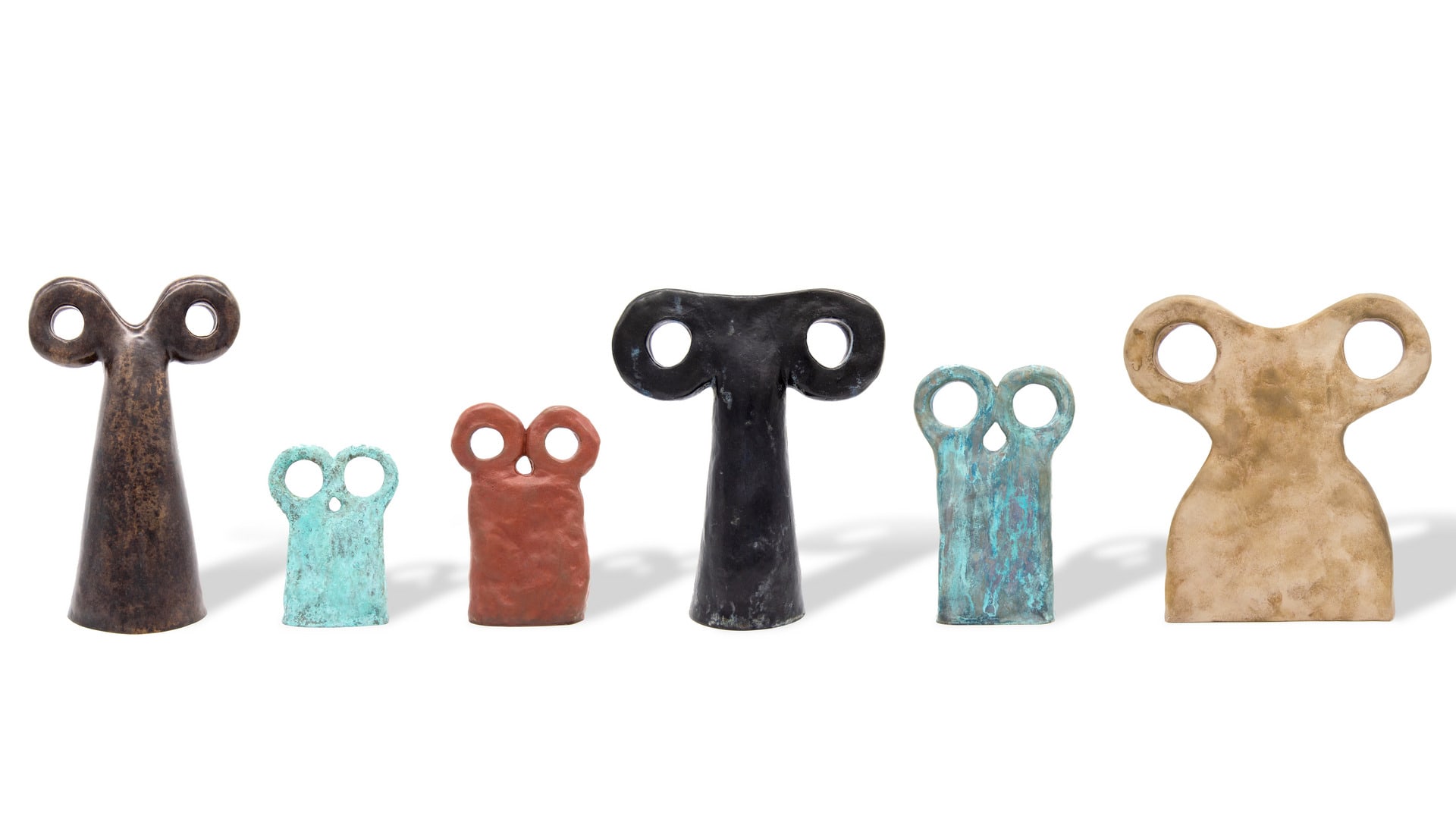 Bronze sculptures of totemic eye idols 