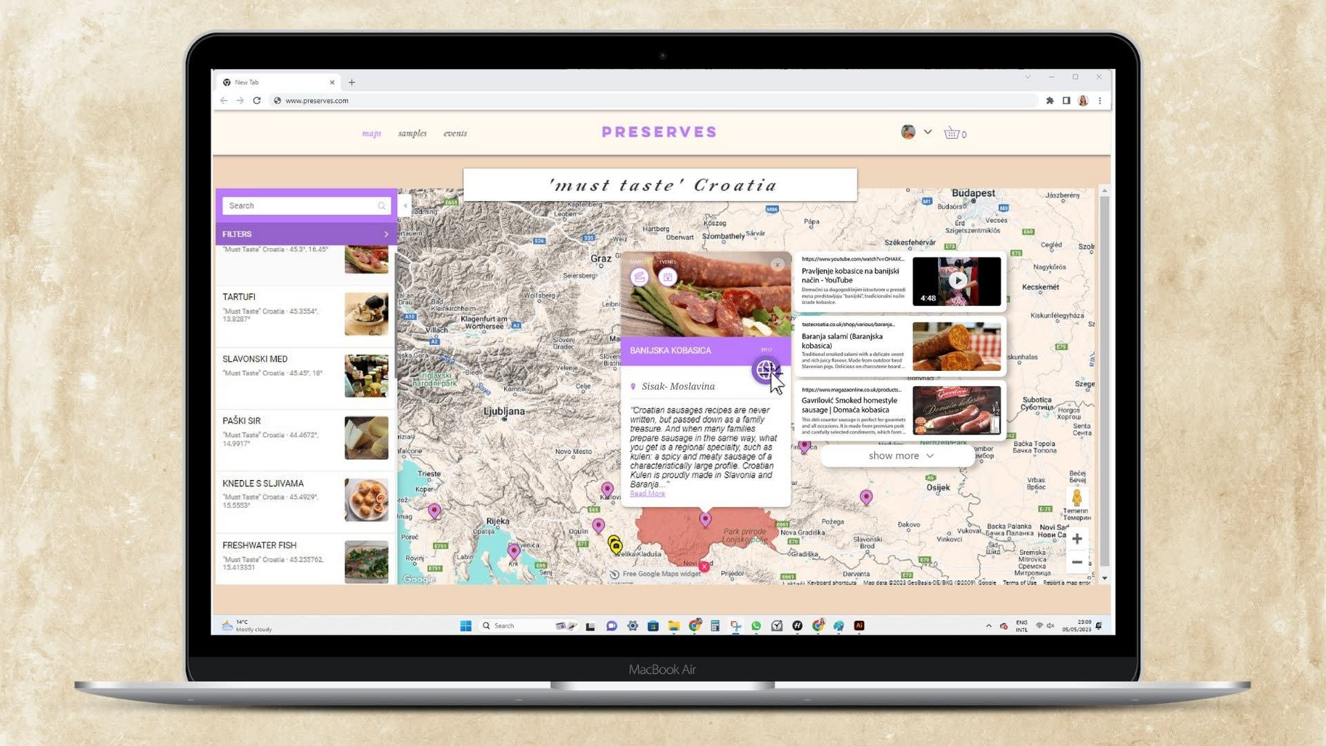 Illustration of computer displaying Preserves website with ''Must Taste'' Map