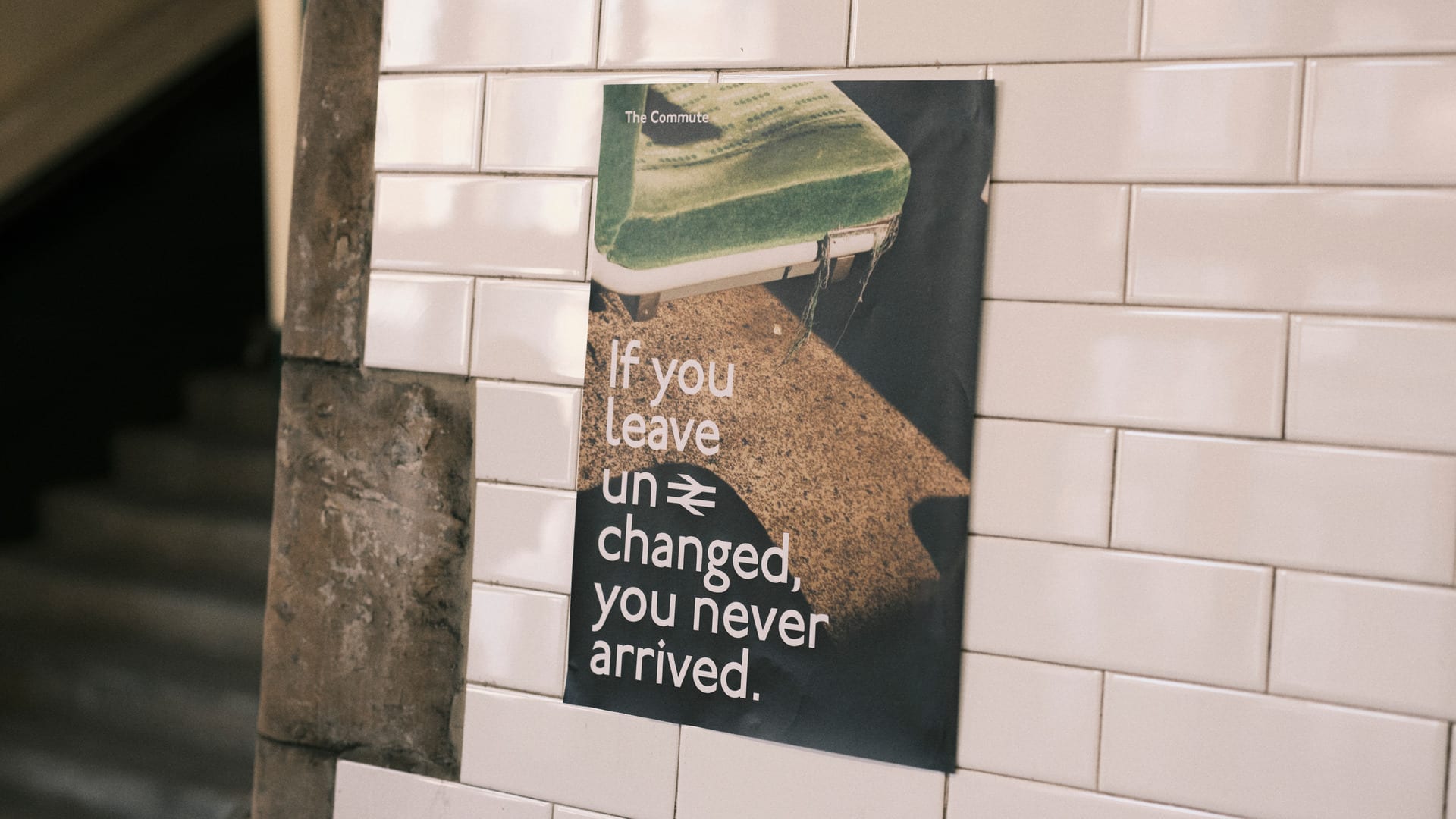 Inside the station, the poster is placed on the wall and reads ‘If you leave unchanged, you never arrived’.