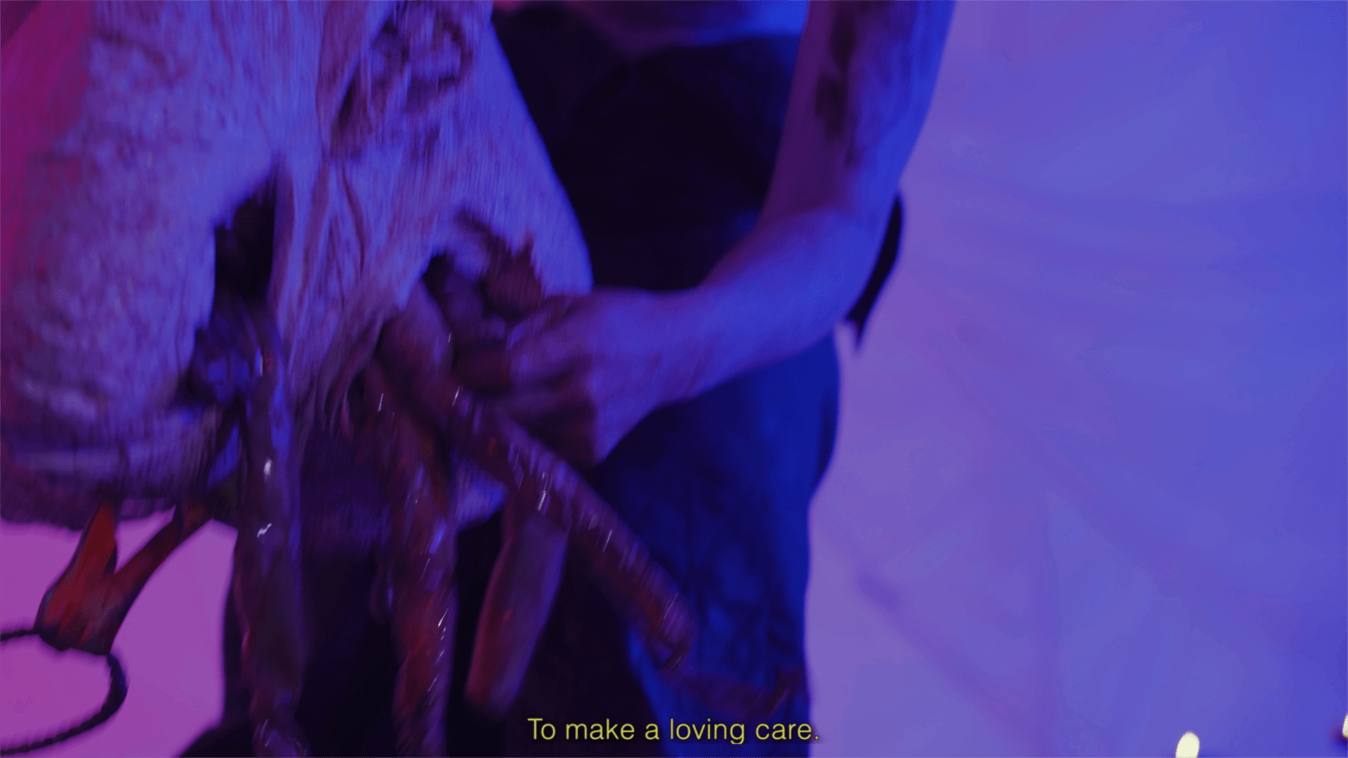 Still from Artist's film entitled True Medicine, in which a woman pulls guts from a plastic sculpture