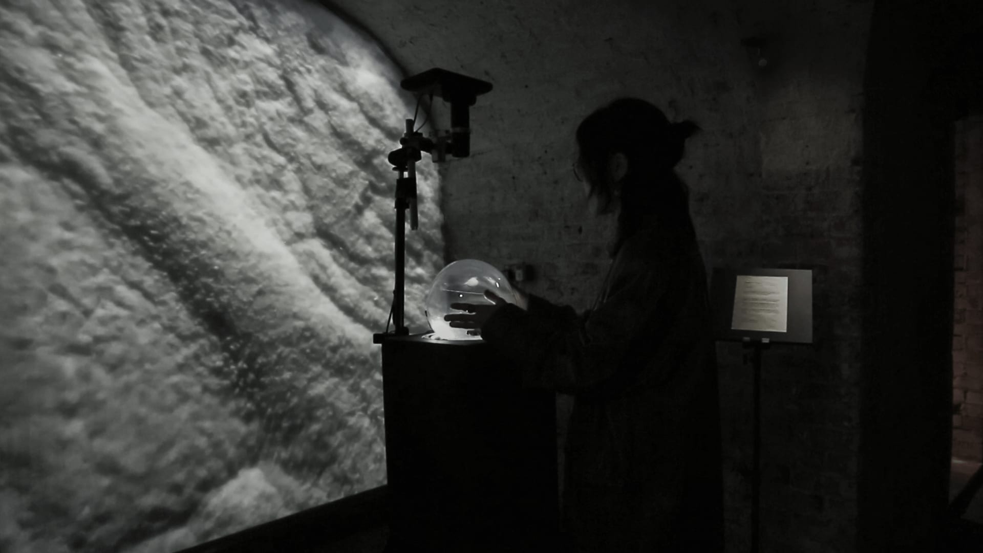 an audience interacting with the ballon of the installation