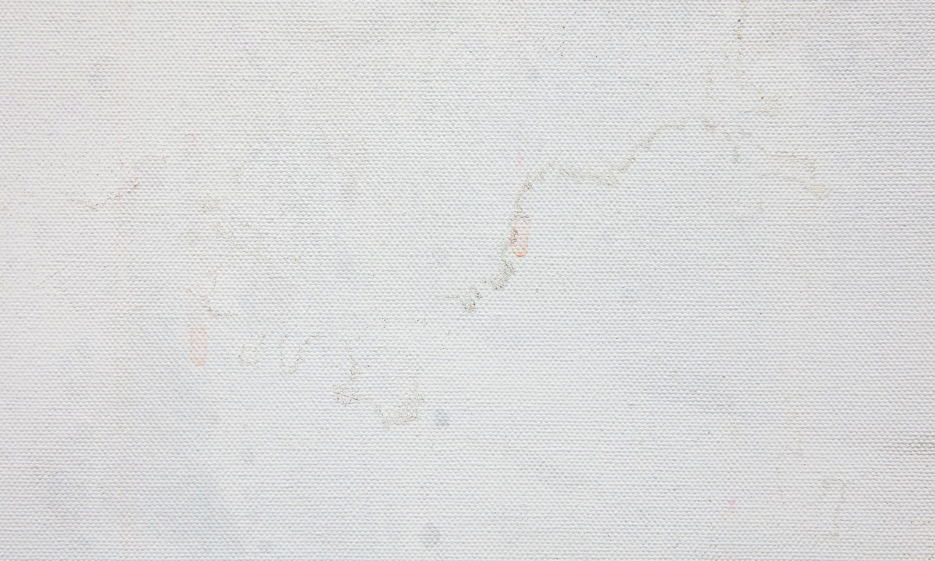 Detail showing full white section with oil haze, brownish and orange bleeding through the surface. Organic form. 