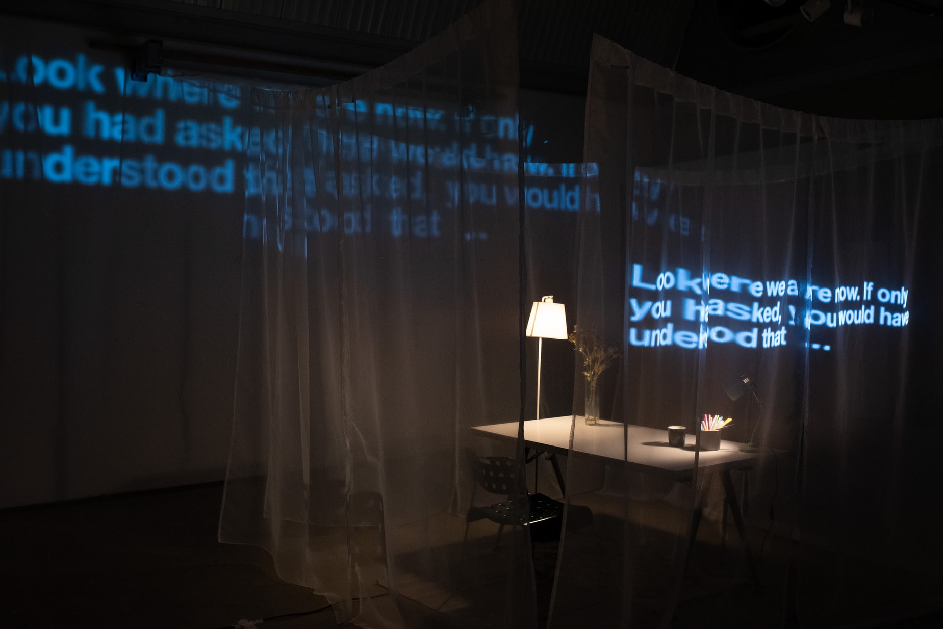 Installation with projections and netted private space inspired by confession boxes. An interactive digital platform awaits.