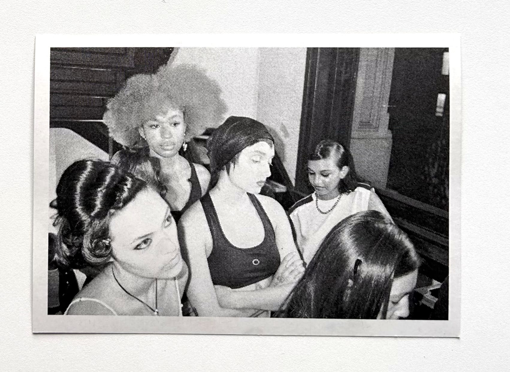 models at a fashion show waiting backstage