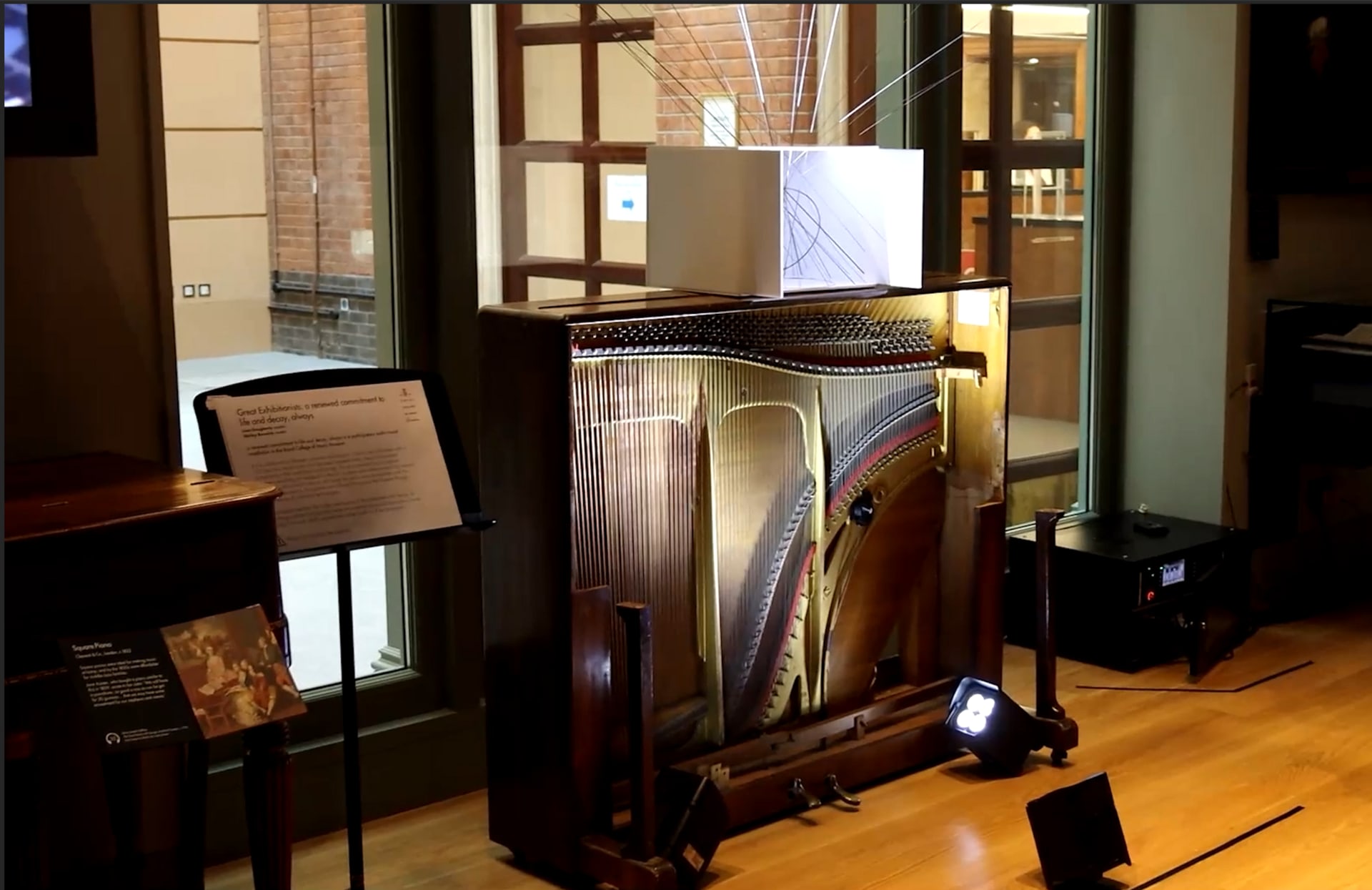 piano wire sound sculpture  installation in museum of musical instruments